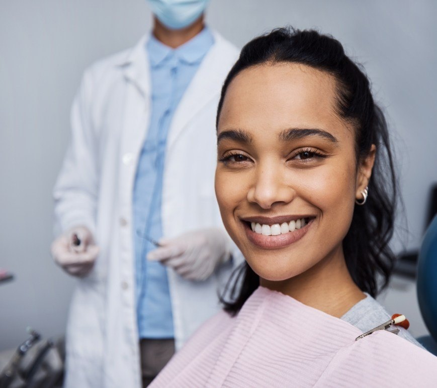 Woman smiling right before a dental checkup