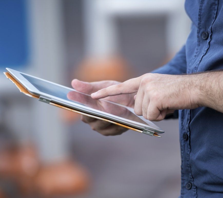 Person scrolling on a tablet screen