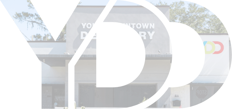 Your Downtown Dentistry logo with dental office in background