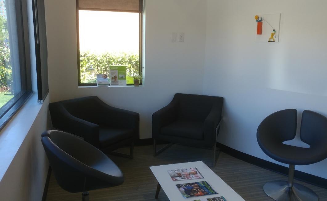 Black chairs in waiting area